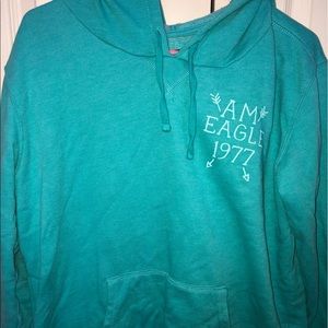 Light blue throw over sweater